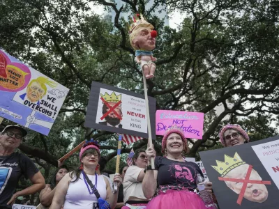 People gather in Houston for the "No Kings" nationwide demonstration on Saturday, June 14, 2025. (Raquel Natalicchio/Houston Chronicle via AP)