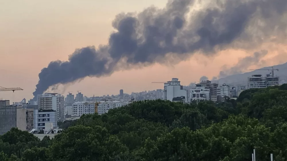 Smoke rises from the building of Iran's state-run television after an Israeli strike in Tehran, Iran, Monday, June 16, 2025. (AP Photo)