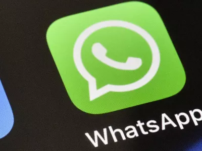 FILE - A WhatsApp icon is displayed on an iPhone, Nov. 15, 2018, in Gelsenkirchen, Germany. (AP Photo/Martin Meissner, File)