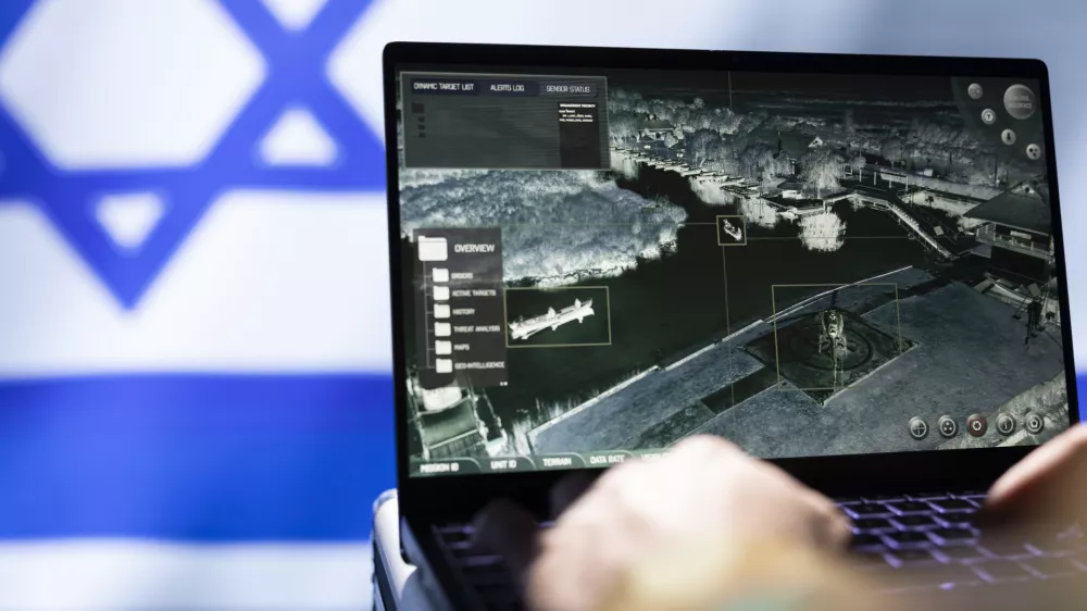 Mossad agent using laptop device, operating anti ballistic system designed to counter missiles threatening country. Close up shot of Israeli counterintelligence officer defending against rockets
