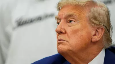 U.S. President Donald Trump looks on during a meeting with players of the Juventus soccer team in the Oval Office of the White House in Washington, D.C., U.S., June 18, 2025. REUTERS/Nathan Howard