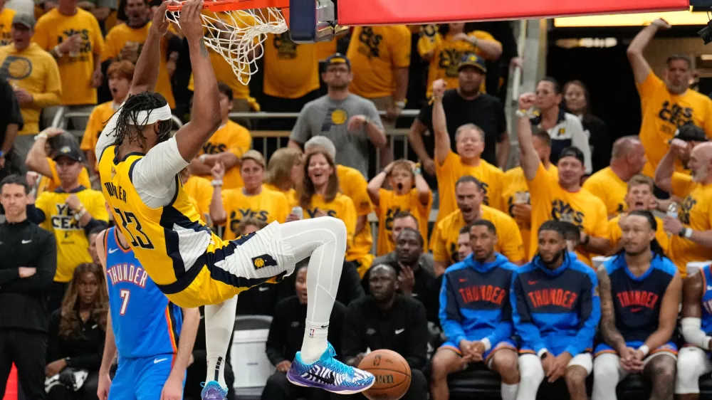 Jun 19, 2025; Indianapolis, Indiana, USA; Indiana Pacers center Myles Turner (33) dunks the ball against the Oklahoma City Thunder in the third quarter during game six of the 2025 NBA Finals at Gainbridge Fieldhouse. Mandatory Credit: Kyle Terada-Imagn Images