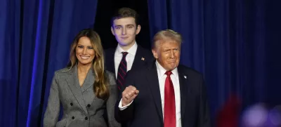 FILE - Republican presidential nominee former President Donald Trump, joined by wife Melania Trump, left, and son Barron Trump, arrives to speak at an election night watch party, Nov. 6, 2024, in West Palm Beach, Fla. (AP Photo/Alex Brandon, File)