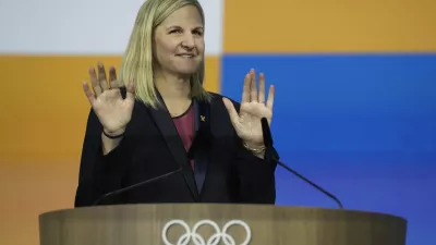 Kirsty Coventry gestures as she speaks after she was announced as the new IOC President at the International Olympic Committee 144th session in Costa Navarino, western Greece, Thursday, March 20, 2025. (AP Photo/Thanassis Stavrakis)