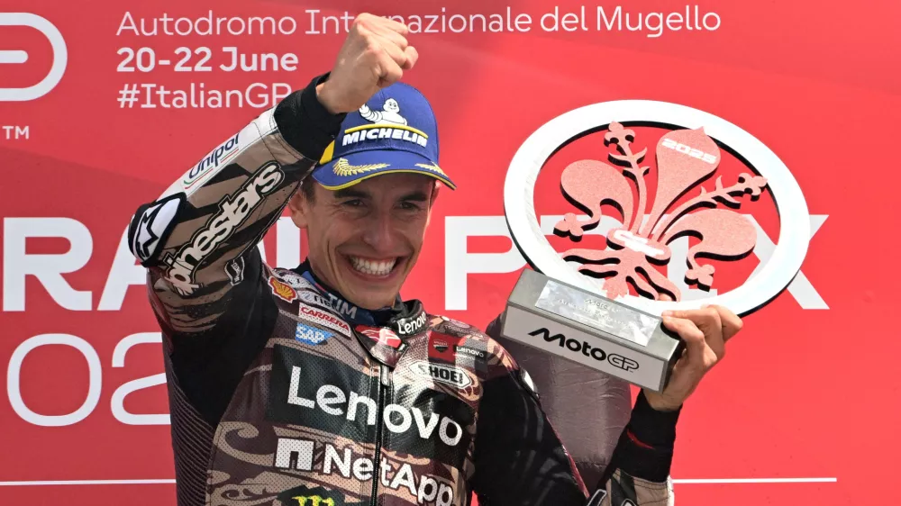 MotoGP - Italian Grand Prix - Mugello Circuit, Scarperia e San Piero, Italy - June 22, 2025 Ducati Lenovo Team's Marc Marquez celebrates on the podium with a trophy after winning the Italian Grand Prix REUTERS/Jennifer Lorenzini