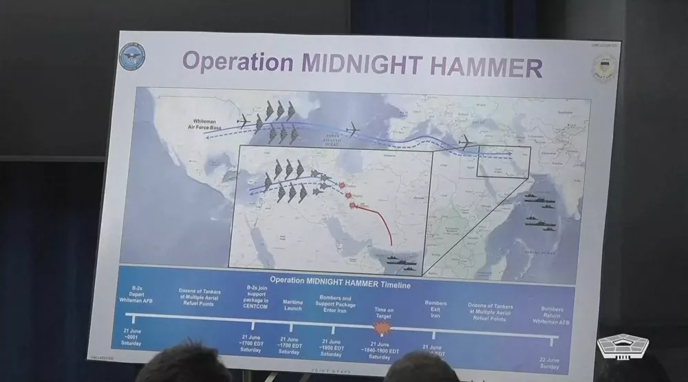 A poster of "Operation Midnight Hammer" is displayed during a briefing at the Pentagon, after the U.S. struck Iranian nuclear facilities, during the Israel-Iran conflict, in Arlington, Virginia, U.S., June 22, 2025 in this still image taken from handout video. Reuters TV/U.S. Department of Defense/Handout via REUTERS THIS IMAGE HAS BEEN SUPPLIED BY A THIRD PARTY