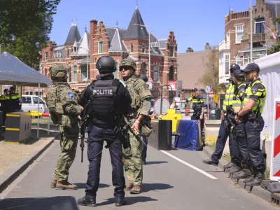 Security patrol around the perimeter of the venue in The Hague, Netherlands, Monday, June 23, 2025 ahead of the upcoming NATO summit. (AP Photo/Patrick Post)