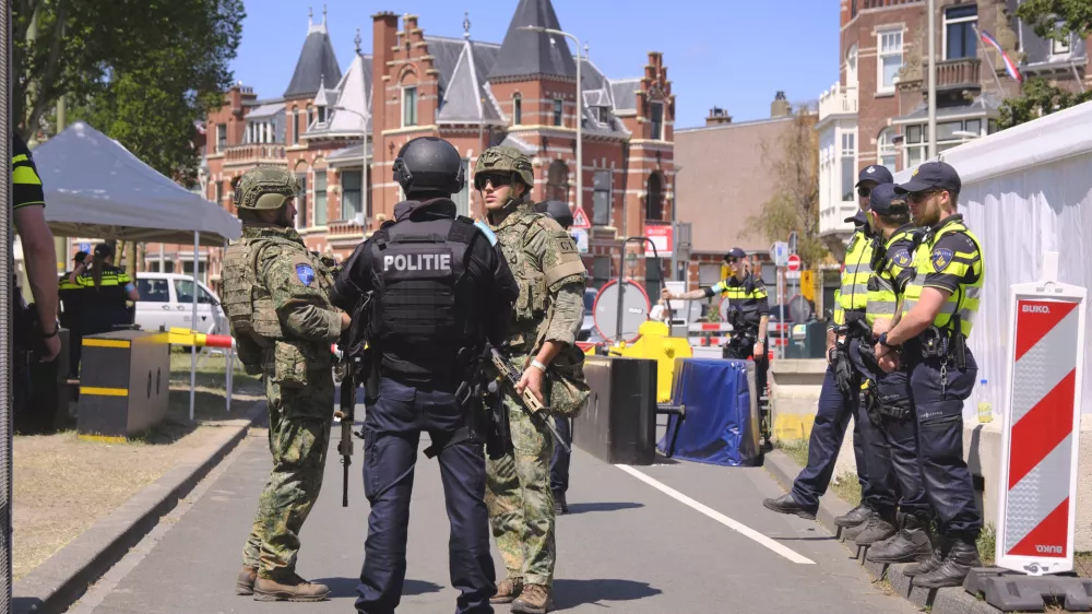 Security patrol around the perimeter of the venue in The Hague, Netherlands, Monday, June 23, 2025 ahead of the upcoming NATO summit. (AP Photo/Patrick Post)