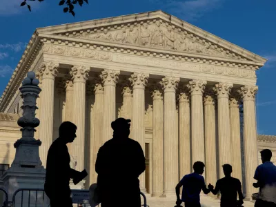 FILE PHOTO: People gather outside the U.S. Supreme Court in Washington, U.S., June 29, 2024. REUTERS/Kevin Mohatt/File Photo