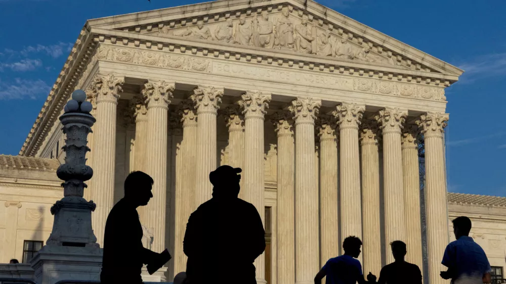FILE PHOTO: People gather outside the U.S. Supreme Court in Washington, U.S., June 29, 2024. REUTERS/Kevin Mohatt/File Photo