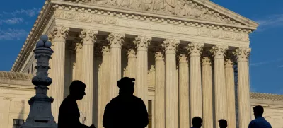 FILE PHOTO: People gather outside the U.S. Supreme Court in Washington, U.S., June 29, 2024. REUTERS/Kevin Mohatt/File Photo