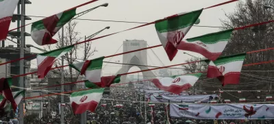 11 February 2019, Iran, Tehran: People gather in front of the Azadi Tower at the Azadi Square during a ceremony marking the 40th anniversary of the Iranian Islamic Revolution. Photo: Saeid Zareian/dpa