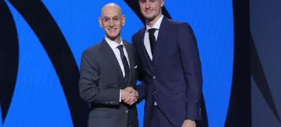 Jun 25, 2025; Brooklyn, NY, USA; Cooper Flagg poses with NBA commissioner Adam Silver after being selected as first overall by the Dallas Mavericks in the first round of the 2025 NBA Draft at Barclays Center. Mandatory Credit: Brad Penner-Imagn Images