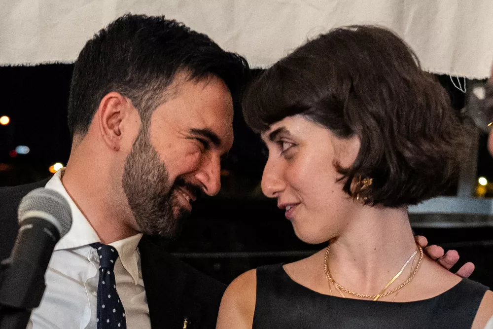 Zohran Mamdani and his wife, Rama Duwaji, look into each other's eyes during a watch party for his primary election, which includes his bid to become the Democratic candidate for New York City mayor in the upcoming November 2025 election, in New York City, U.S., June 25, 2025. REUTERS/David 'Dee' Delgado
