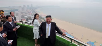 North Korean leader Kim Jong Un and his daughter Kim Ju Ae stand on a balcony facing the beach during a ceremony to celebrate the completion of the Wonsan Kalma Coastal Tourist Zone, in Wonsan, in North Korea, June 24, 2025. KCNA via REUTERS  ATTENTION EDITORS - THIS IMAGE WAS PROVIDED BY A THIRD PARTY. REUTERS IS UNABLE TO INDEPENDENTLY VERIFY THIS IMAGE. NO THIRD PARTY SALES. SOUTH KOREA OUT. NO COMMERCIAL OR EDITORIAL SALES IN SOUTH KOREA.   TPX IMAGES OF THE DAY