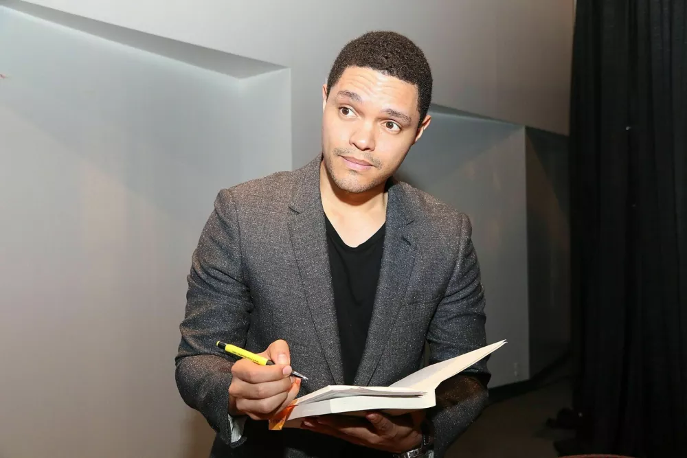 KJ8CTM MIAMI, FL - NOVEMBER 13: Trevor Noah speaks about his book 'Born a Crime' during the Miami Book Fair at the Miami Dade College Wolfson Campus on Sunday, November 13, 2016 in downtown Miami, FloridaPeople: Trevor Noah