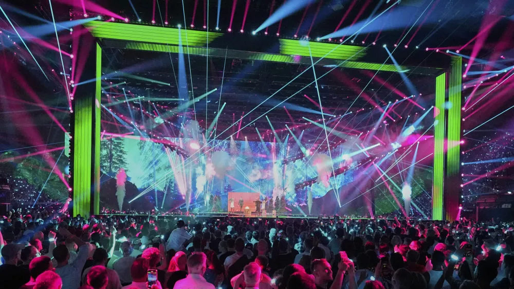 KAJ from Sweden performs the song "Bara Bada Bastu" during the dress rehearsal for the Grand Final of the 69th Eurovision Song Contest, in Basel, Switzerland, Friday, May 16 2025. (AP Photo/Martin Meissner)