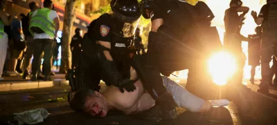 Law enforcement officers detain a demonstrator, during an anti-government protest demanding snap elections, in Belgrade, Serbia, June 28, 2025. REUTERS/Marko Djurica