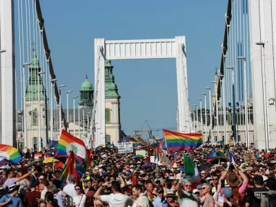 FILE PHOTO: People cross the Elisabeth Bridge during the Budapest Pride March in Budapest, Hungary, June 28, 2025. REUTERS/Bernadett Szabo/File Photo