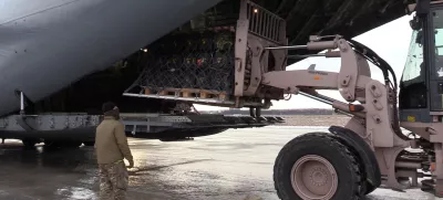 Ukrainian service members unload anti-tank weapons supplied by Britain at the Boryspil airport outside Kyiv, Ukraine January 18, 2022. Picture taken January 18, 2022. Ukrainian Defence Ministry/Handout via REUTERS ATTENTION EDITORS - THIS IMAGE WAS PROVIDED BY A THIRD PARTY.