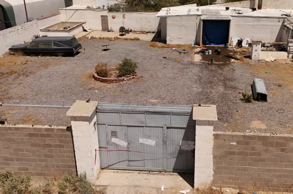 A drone view shows a crematorium where authorities found bodies piled up in unsanitary conditions, after local funeral homes hired its services for cremation, according to the Chihuahua State Prosecutor's Office, in Ciudad Juarez, Mexico June 30, 2025. REUTERS/Jose Luis Gonzalez