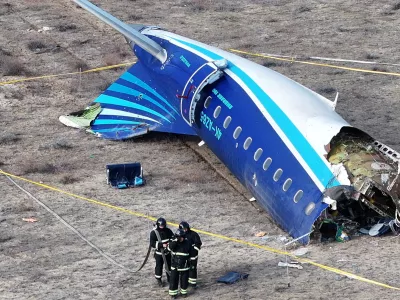 FILE PHOTO: A drone view shows emergency specialists working at the crash site of an Azerbaijan Airlines passenger plane near the city of Aktau, Kazakhstan December 25, 2024. REUTERS/Azamat Sarsenbayev/File Photo
