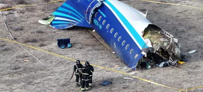 FILE PHOTO: A drone view shows emergency specialists working at the crash site of an Azerbaijan Airlines passenger plane near the city of Aktau, Kazakhstan December 25, 2024. REUTERS/Azamat Sarsenbayev/File Photo