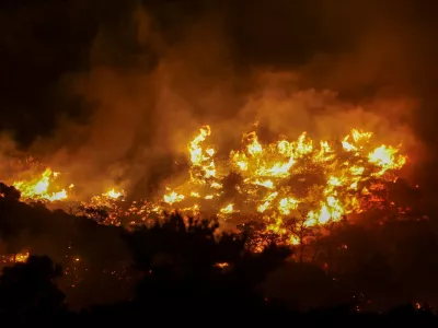 Flames rise as a wildfire burns near Ierapetra, on the island of Crete, Greece, July 2, 2025. REUTERS/Stefanos Rapanis