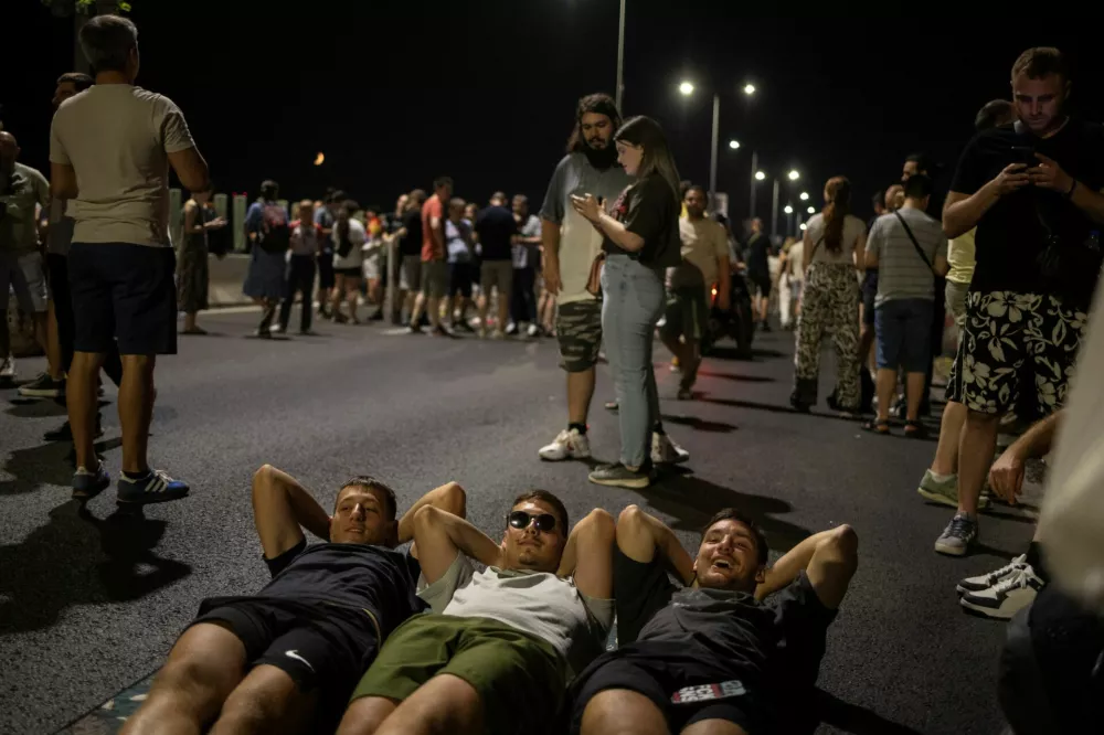Demonstrators block the road during an anti-government protest demanding snap elections, in Belgrade, Serbia, June 29, 2025. REUTERS/Marko Djurica