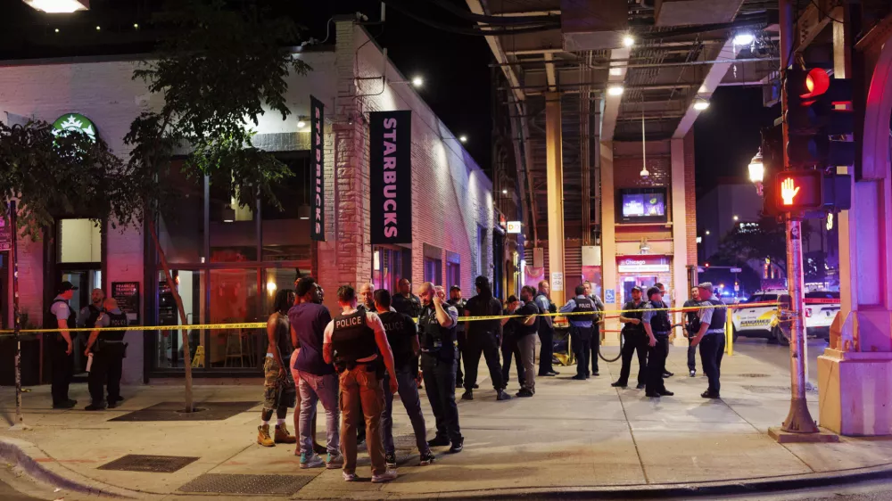 Officers work the scene of a shooting Wednesday, July 2, 2025, in Chicago. (Armando L. Sanchez/Chicago Tribune via AP)
