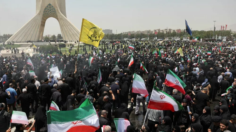 People attend the funeral procession of Iranian military commanders, nuclear scientists and others killed in Israeli strikes, in Tehran, Iran, June 28, 2025. Majid Asgaripour/WANA (West Asia News Agency) via REUTERS  ATTENTION EDITORS - THIS PICTURE WAS PROVIDED BY A THIRD PARTY