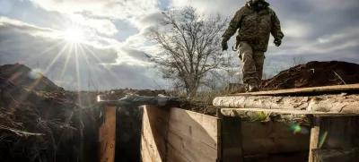 FILE PHOTO: Ukrainian military engineer with the callsign Lynx inspects a freshly dug trench that his unit built as part of a system of new fortifications near the front lines outside Kupiansk, amid Russia's attack on Ukraine, December 28, 2023. REUTERS/Thomas Peter/File Photo