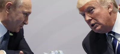 FILE – Then-U.S. President Donald Trump, right, meets with Russian President Vladimir Putin at the G20 Summit in Hamburg, Germany, Friday, July 7, 2017. (AP Photo/Evan Vucci, File)