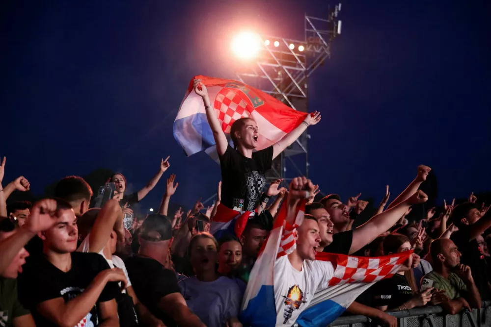 Fans react during concert of Marko Perkovic Thompson, that is poised to break the world record for largest paid concert, in Zagreb, Croatia, July 5, 2025. REUTERS/Antonio Bronic