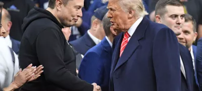 FILE PHOTO: Mar 22, 2025; Philadelphia, PA, USA; Elon Musk and President Donald Trump during the Division I Men's Wrestling Championship held at Wells Fargo Center. Mandatory Credit: Eric Hartline-Imagn Images/File Photo