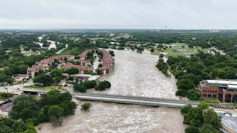 A drone view shows the swollen San Gabriel river, in Georgetown, Texas, U.S. July 5, 2025 in this screen grab from social media video. Adam Grumbo/via REUTERS THIS IMAGE HAS BEEN SUPPLIED BY A THIRD PARTY. MANDATORY CREDIT. NO RESALES. NO ARCHIVES.