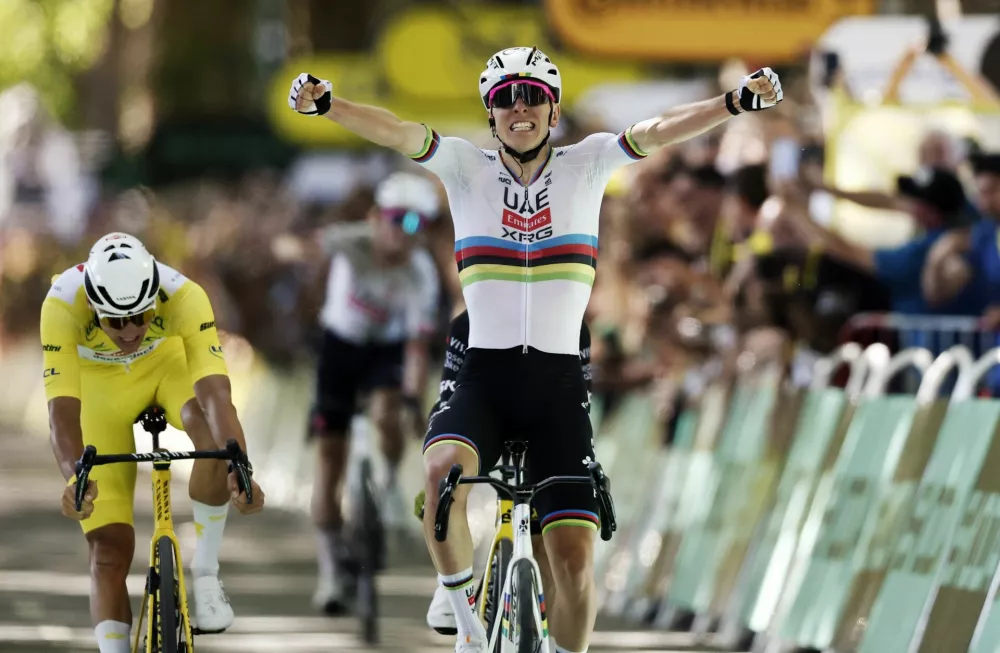 Cycling - Tour de France - Stage 4 - Amiens to Rouen - Rouen, France - July 8, 2025 UAE Team Emirates XRG's Tadej Pogacar celebrates winning stage 4 REUTERS/Benoit Tessier