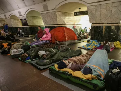 People take shelter inside a metro station during a Russian drone and missile strike, amid Russia's attack on Ukraine, in Kyiv, Ukraine July 12, 2025. REUTERS/Stringer   TPX IMAGES OF THE DAY