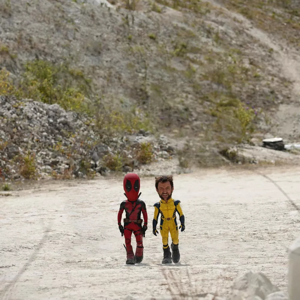 Story from Jam Press (Mini Movies)Pictured: Deadpool & Wolverine. Artist turns celebs into hilarious pint-sized movie stars &ndash; and Dua Lipa's a fanMonterrey-based content creator Oscar Hinojosa has a very particular set of skills &mdash; the kind that involves making movie heroes small enough to fit in your pocket. Using nothing but Photoshop, a well-timed brownie, and the brainchild of one very tiny dog, Oscar has carved out a delightfully odd digital niche: creating "mini celebrities" from film, sport, and pop culture.His inspiration? A pint-sized pup and a weekend experiment with a "special brownie." Oscar recalls staring at his miniature mutt and thinking, "What would I look like if I were that tiny?" One Photoshop session later, he had his answer. Since then, he's miniaturized everyone from Michael J. Fox in Back to the Future to a shrunken Will Smith fending off miniature monsters in I Am Legend. "It's nostalgic and fun," he says."As long as people keep enjoying it, I'll keep creating." And enjoy it, they do. Oscar's micro-makeovers of Gladiator's Russell Crowe wielding a thimble-sized sword, or Cillian Murphy brooding in a baby Peaky Blinders cap, have earned him thousands of likes and a few celebrity reposts. Finneas (Billie Eilish's brother) is a serial sharer, and Oscar suspects he might be using the mini edits to tease his sister. Meanwhile, Dua Lipa gave one of his posts her stamp of approval &mdash; a moment he describes as "surreal."Each piece takes about 30 minutes now (down from an hour), all crafted manually with Adobe Photoshop &mdash; no AI, just old-school YouTube learning. While some edits are a breeze, like a tiny Kevin from Home Alone defending his micro-house, others like his tennis-themed pieces or Cristiano Ronaldo lifting a mouse-sized trophy take time and a perfect shot. And what's the most common reaction? "People love it when I mini someone who's already short. I get comments like, 'Where's the edit?'" Oscar laughs. With over 30,000 likes on some posts and a global fanbase, Oscar (also known as Phetru) proves that no dream is too small &mdash; literally.ENDS,Image: 1020791738, License: Rights-managed, Restrictions:, Model Release: no