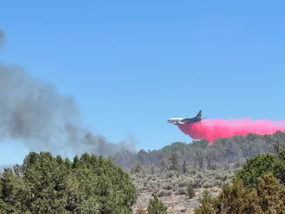 This photo provided by the Bureau of Land Management shows aerial resources working to suppress White Sage wildfire burning north of Grand Canyon National Park in Ariz., on Thursday, July 10, 2025. (Bureau of Land Management, Arizona State Office via AP)