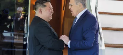 In this photo provided by the North Korean government, its leader Kim Jong Un, left, and Russian Foreign Minister Sergey Lavrov shake hands in Wonsan, North Korea, Saturday, July 12, 2025. Independent journalists were not given access to cover the event depicted in this image distributed by the North Korean government. The content of this image is as provided and cannot be independently verified. Korean language watermark on image as provided by the source reads: "KCNA," which is the abbreviation for Korean Central News Agency. (Korean Central News Agency/Korea News Service via AP)