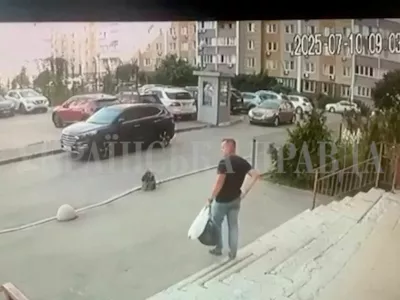 A CCTV footage shows a Security Service of Ukraine (SBU) officer walking down the stairs moments before he was shot in Kyiv, Ukraine July 10, 2025 in this screengrab obtained from a social media video. Ukrainska Pravda/via REUTERS THIS IMAGE HAS BEEN SUPPLIED BY A THIRD PARTY. MANDATORY CREDIT. UKRAINE OUT. NO COMMERCIAL OR EDITORIAL SALES IN UKRAINE. RUSSIA OUT. NO COMMERCIAL OR EDITORIAL SALES IN RUSSIA. WATERMARK FROM SOURCE. TPX IMAGES OF THE DAY VERIFICATION: - Guard box, buildings and parking lot layout matched file and satellite imagery - Date verified by timestamp and Reuters reporting