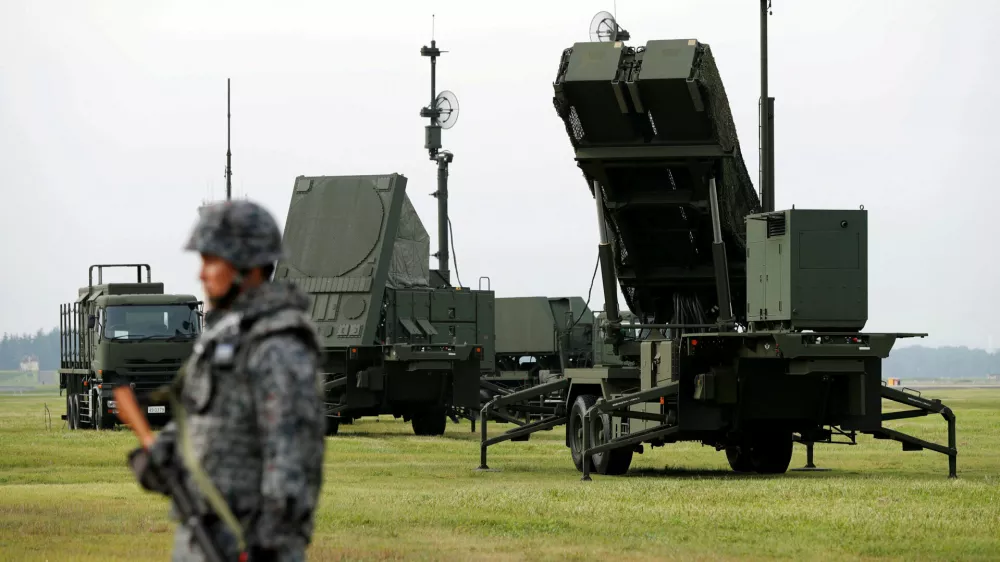 FILE PHOTO: A Japan Self-Defense Forces (JSDF) soldier takes part in a drill to mobilise their Patriot Advanced Capability-3 (PAC-3) missile unit at U.S. Air Force Yokota Air Base in Fussa on the outskirts of Tokyo, Japan August 29, 2017.  REUTERS/Issei Kato/File Photo