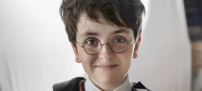 This image released by HBO shows Dominic McLaughlin, who will portray Harry Potter, on the set of HBO series "Harry Potter," scheduled for 2027. (Aidan Monaghan/HBO via AP)