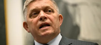 FILE PHOTO: Slovakia's Prime Minister Robert Fico attends a press conference, as he marks the anniversary of his attempted assassination, at the site of the attack, in Handlova, central Slovakia May 15, 2025. REUTERS/Radovan Stoklasa/File Photo