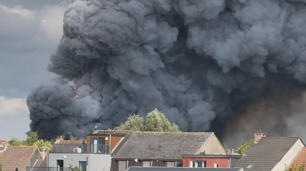 Fireworks burst and smoke rises as a fire engulfs the main stage of Tomorrowland, an electronic music event, in Boom, Belgium, July 16, 2025 in this still image from social media video. Morgan Hermans via REUTERS THIS IMAGE HAS BEEN SUPPLIED BY A THIRD PARTY. MANDATORY CREDIT. NO RESALES. NO ARCHIVES.