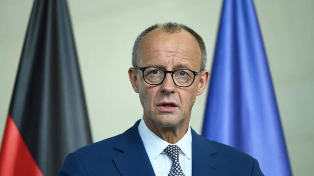 18 July 2025, Berlin: Germany's Chancellor Friedrich Merz speaks during a press conference with Romanian President Nicusor Dan (not pictured) in the Federal Chancellery. Photo: Malin Wunderlich/dpa