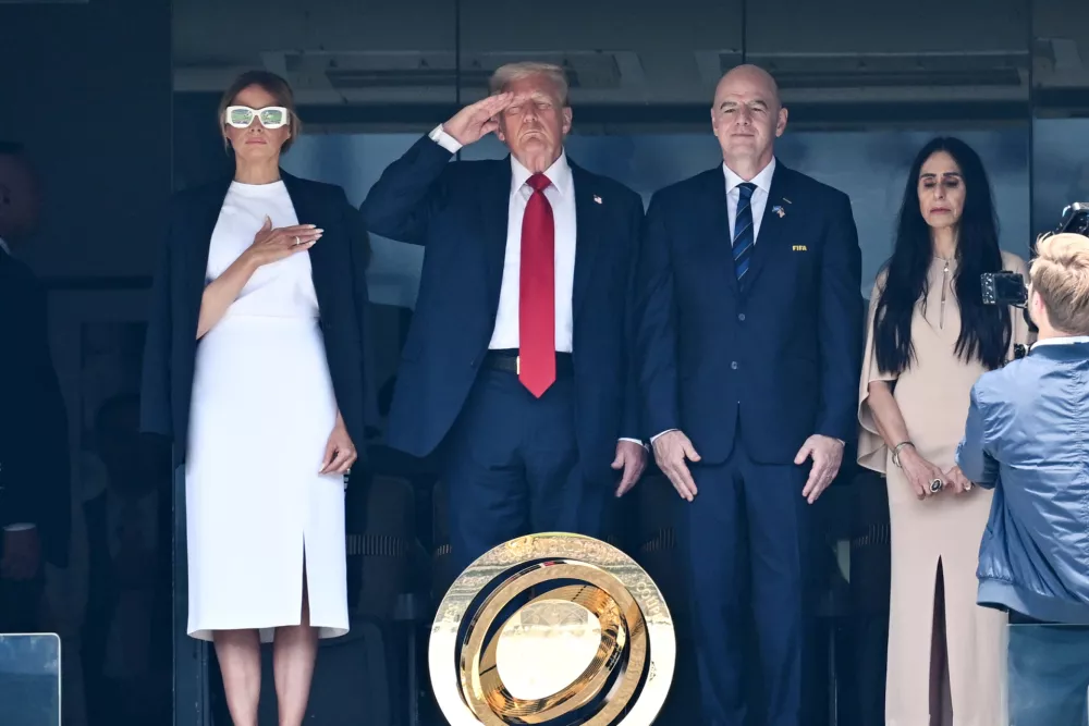 13 July 2025, US, East Rutherford: (R-L) FIFA President Gianni Infantino, USA President Donald Trump and First Lady Melania Trump ahead of the FIFA Club World Cup final soccer match between Chelsea FC and Paris Saint-Germain at MetLife Stadium. Photo: Sven Hoppe/dpa