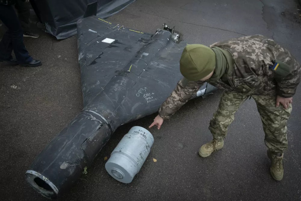 FILE - A Ukrainian officer shows a thermobaric charge from a downed Russian drone in a research laboratory in an undisclosed location in Ukraine on, Nov. 14, 2024. (AP Photo/Efrem Lukatsky, File)