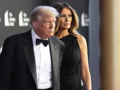 President Donald Trump and first lady Melania Trump arrive to view opening night of "Les Miserables," at the Kennedy Center, Wednesday, June 11, 2025, in Washington. (AP Photo/Alex Brandon)
